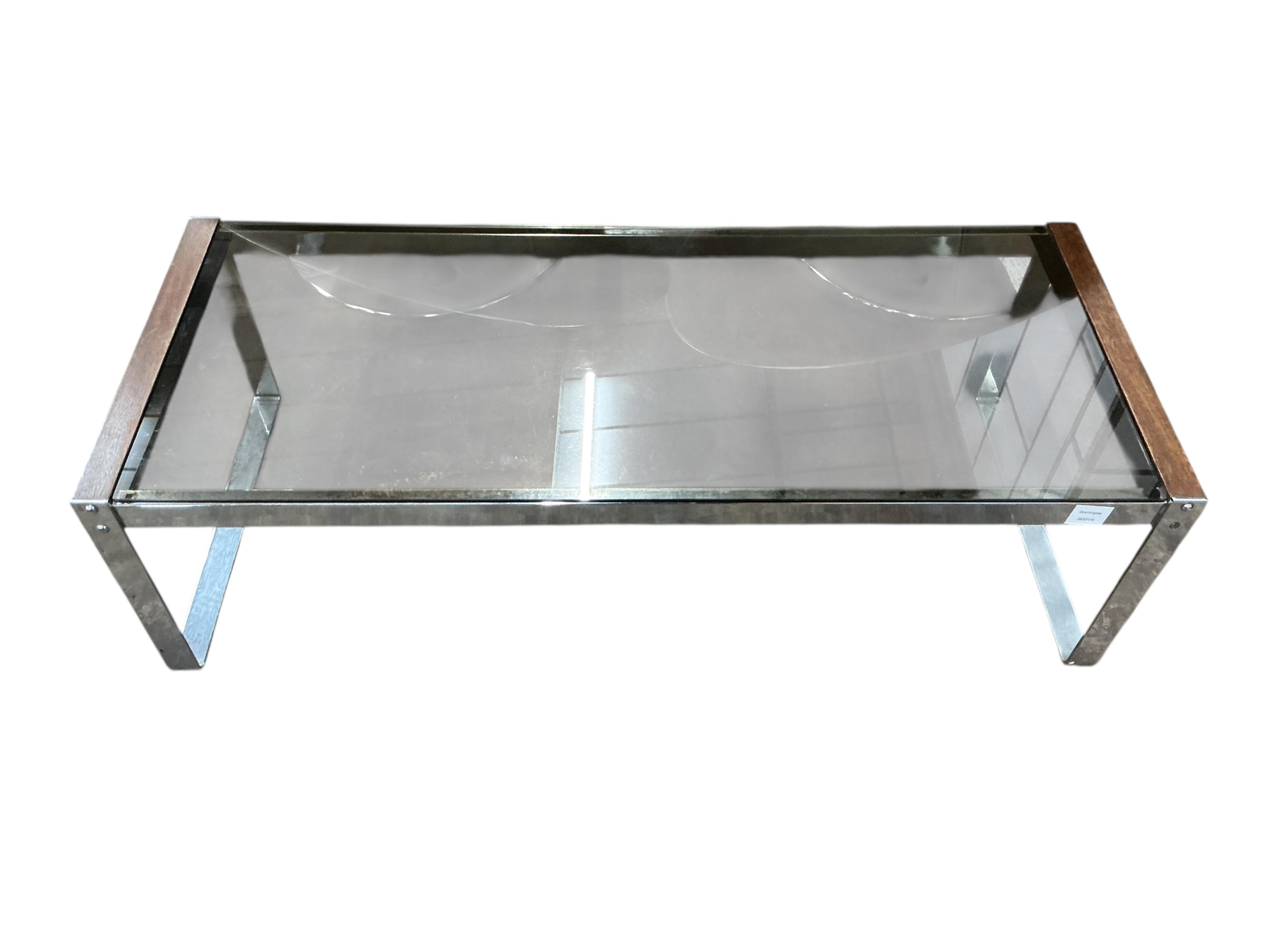 A mid century style teak and chrome rectangular coffee table with smoke glass top, width 114cm, depth 47cm, height 33cm